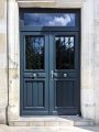 Atulam porte bois avec grille Roussille